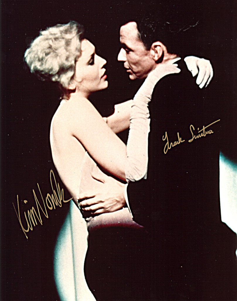 Frank with Kim Novak. That witch can stare!