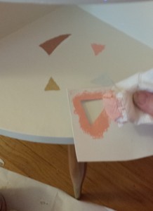 Stenciling on the triangles.